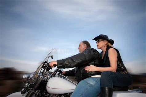 Couple riding a motorcycle stock image. Image of middle - 14827419