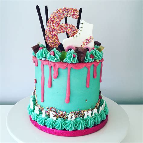 Joint 6 year old boy and girl roller skating party drippy cake. 4 layers of pink and turquoise ...