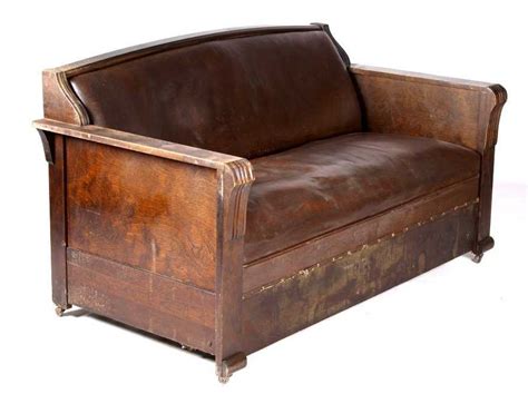 Antique Leather & Wood Sleeper Sofa This is a beli