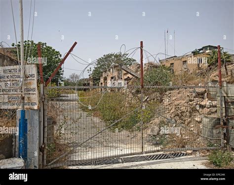 The Green line showing War torn capital city Nicosia Cyprus divided by barbed wire since 1974 ...