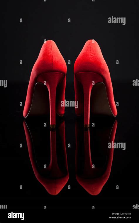 Red Heels With Black Bow