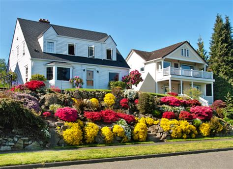 American Dream Home With Flower Garden Stock Photo - Download Image Now - iStock