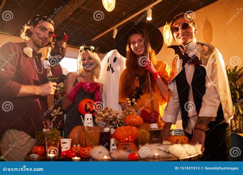 Friends at Halloween Party stock image. Image of dark - 157431913