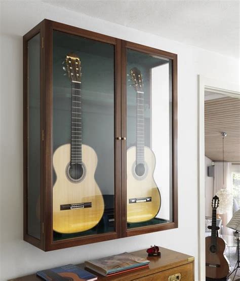 Guitar showcase by Rud. Rasmussen | Guitar display case, Guitar wall ...