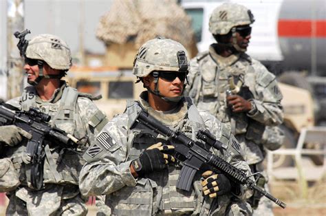 TUNIS, Iraq (October 16, 2007) - U.S. Army Soldiers patrol the streets ...