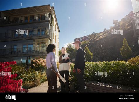 Friends hanging around together Stock Photo - Alamy