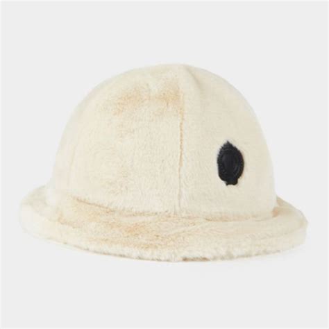 Fluffy badge bucket hat offer at Fabiani