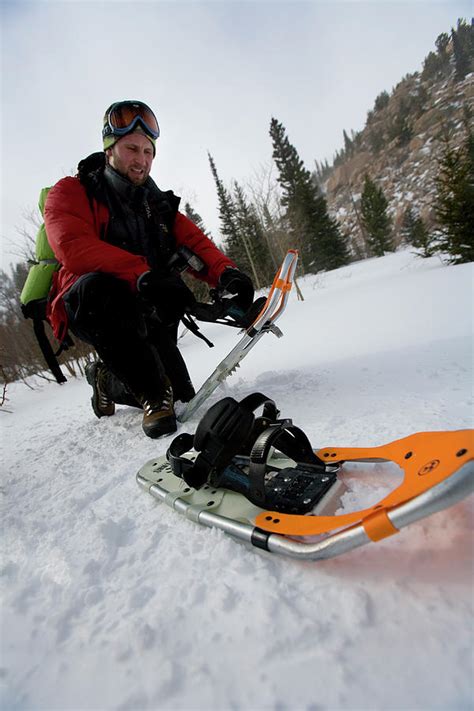 A Man Snowshoeing In Rocky Mountain Photograph by Lisa Seaman - Fine ...