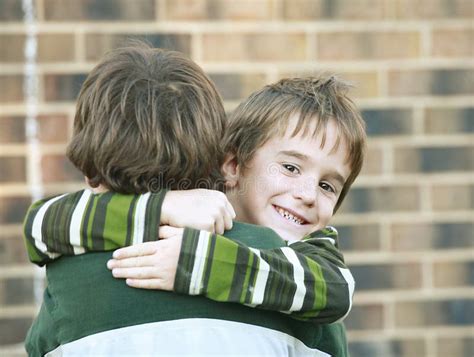 Boy Giving a Hug stock image. Image of happiness, buddies - 3298269