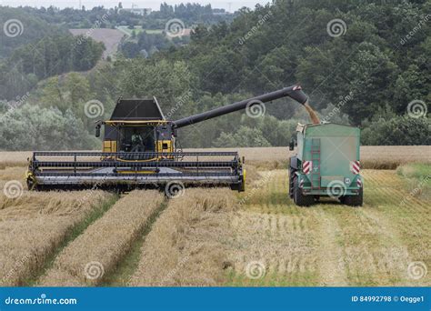 Harvest - Harvesters and Tractors Stock Photo - Image of countryside, corn: 84992798