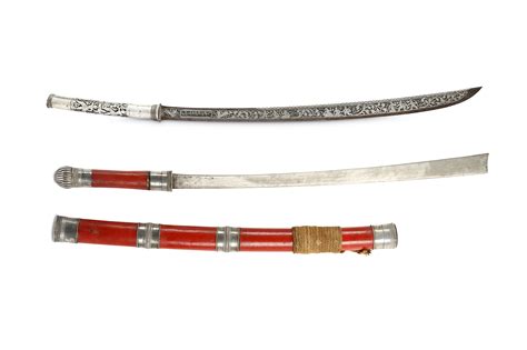 Lot 311 - TWO BURMESE DHA SWORDS