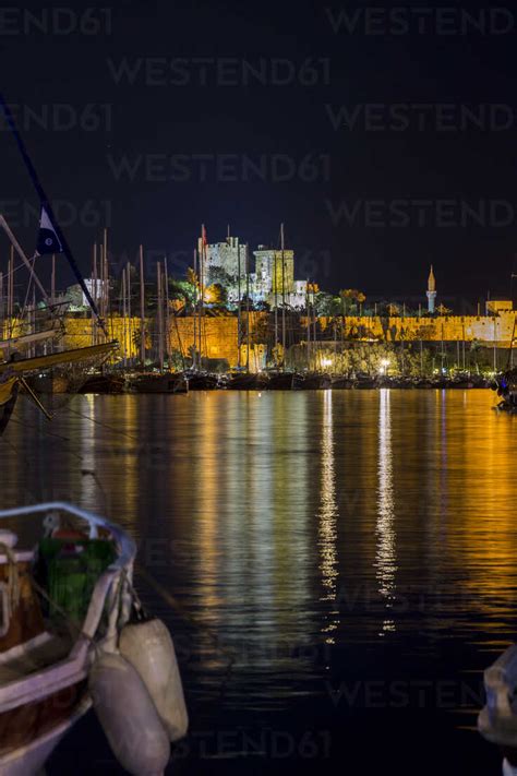Turkey, Bodrum, view to Bodrum Castle and harbour at night stock photo