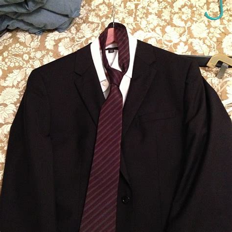 Today's haul, Hugo Boss suit, Burberry tie. | Isaac Lee | Flickr
