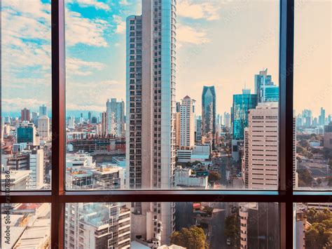 view from skyscraper window on modern city skyline Stock Photo | Adobe Stock