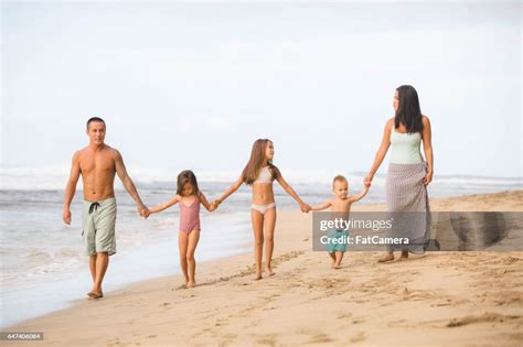 Hawaii Family Vacation On Beach High-Res Stock Photo - Getty Images