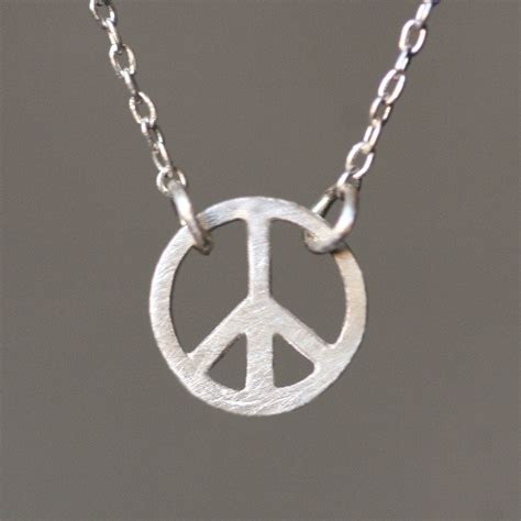 Tiny Round Peace Sign Necklace in Sterling Silver