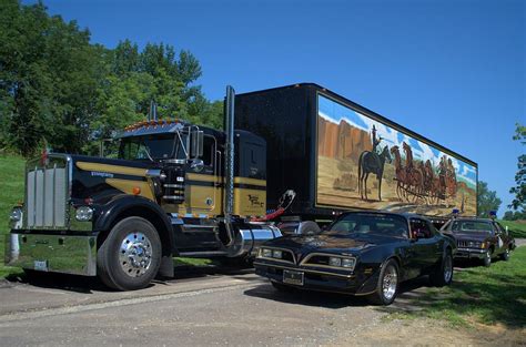 Smokey And The Bandit Tribute 1973 Kenworth Semi Truck And The Bandit Photograph by Tim McCullough