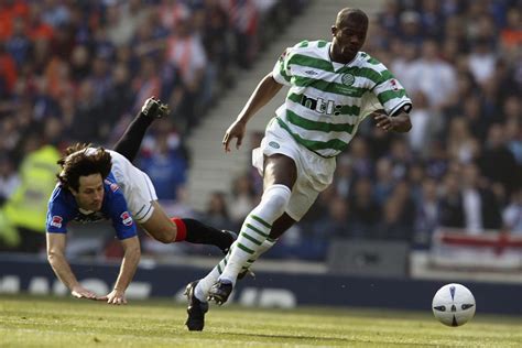 Craig Moore ran away from Bobo Balde after a Celtic derby match at Ibrox - 67 Hail Hail