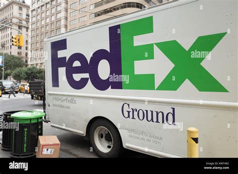Logo on the side of a Federal Express (FedEx) ground delivery truck parked on the Upper East ...