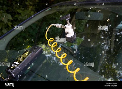 Car windscreen repair Stock Photo - Alamy