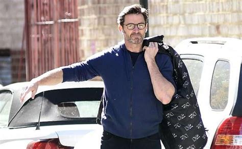 Hugh Jackman spotted hailing a cab in New York