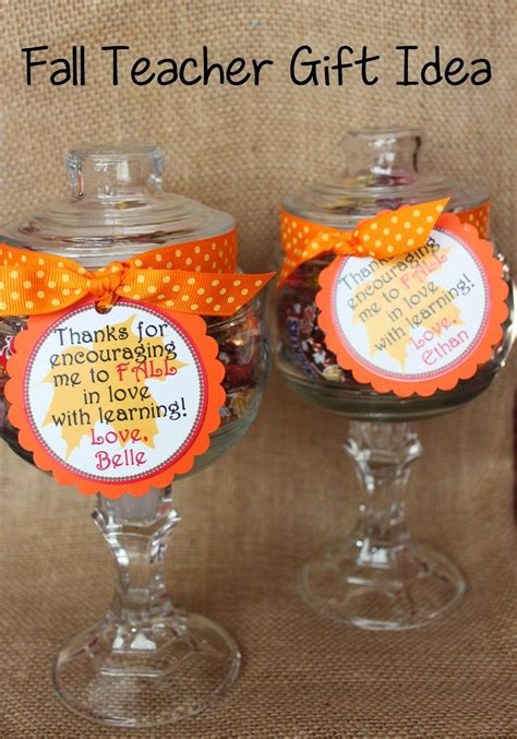 two glass goblets with candy in them on a burlap background and the ...