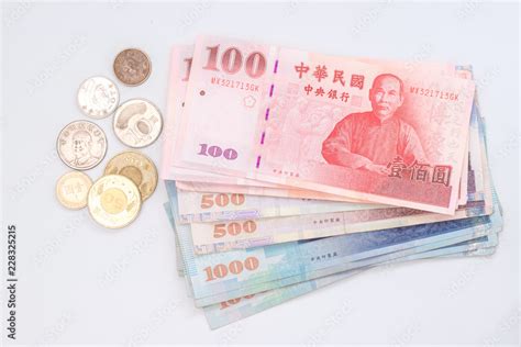 New Taiwan Dollar bill on white background Stock Photo | Adobe Stock