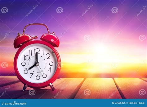 Clock Alarm at Sunrise - Waking Up Stock Photo - Image of reminder ...