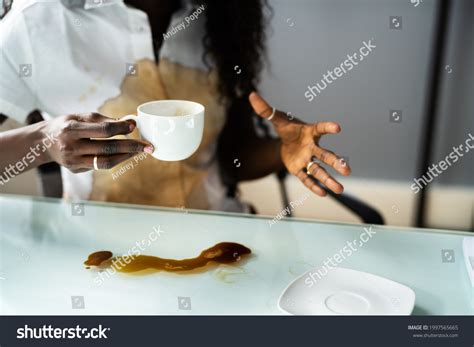 Spilled Coffee On White Shirt Spill Stock Photo 1997565665 | Shutterstock