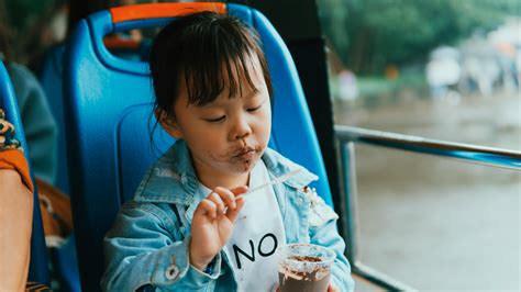 Close-Up Photo of Child Eating Ice Cream · Free Stock Photo