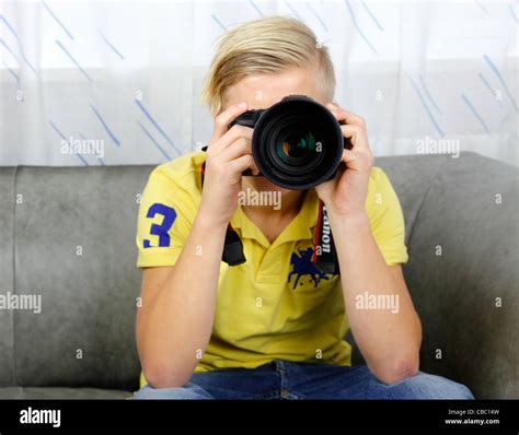 Boy telephoto hi-res stock photography and images - Alamy
