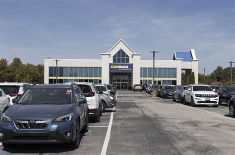 CarMax Auto Dealership Used Car Display. CarMax is the Largest Used and Pre-owned Car Retailer ...