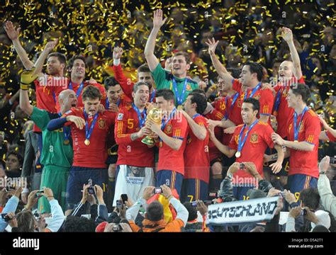 Spain's David Villa kisses the trophy after the 2010 FIFA World Cup ...