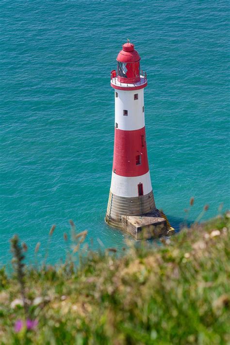 Lighthouse at Beachy Head near Eastbourne, England | Lighthouse, Beautiful lighthouse, Eastbourne