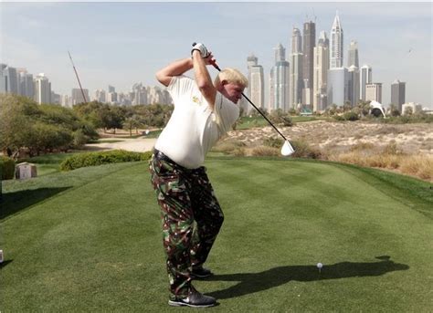 John Daly, mid-swing in Dubai [PIC] : golf