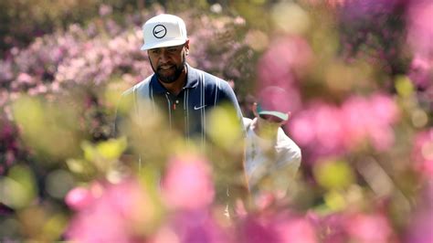 Tony Finau walks from No. 13 during the first round of the Masters at Augusta National Golf Club ...