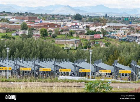 FICKSBURG, SOUTH AFRICA - MARCH 20, 2020: Maputsoe in Lesotho seen accross the Caledon River ...