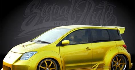 CAR MODIFICATION GALLERY: Toyota Scion Xa with Custom Candy Yellow Paint