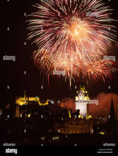 Festival fireworks View of Edinburgh Castle and the Balmoral Hotel, Edinburgh, Scotland, UK ...