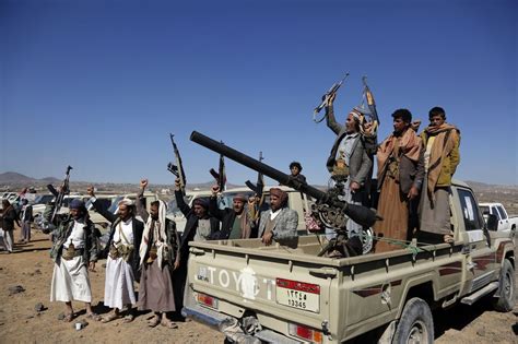 Yemen Houthi rebels fire a missile at a US warship, escalating Mideast ...