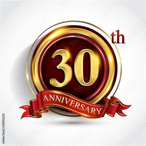 30th anniversary logo with ring and ribbon golden colored isolated on ...