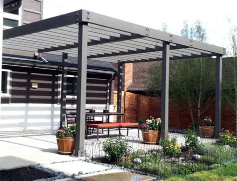 Arbor, pergolas, and shade structures can be designed and installed in many ways. Here a clean ...