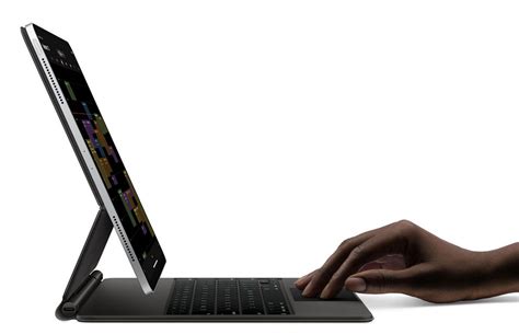 The Touch Screen MacBook is Here. The Magic KeyBoard might be imperfect ...