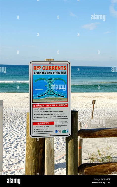 Florida beach rip current warning sign Stock Photo - Alamy