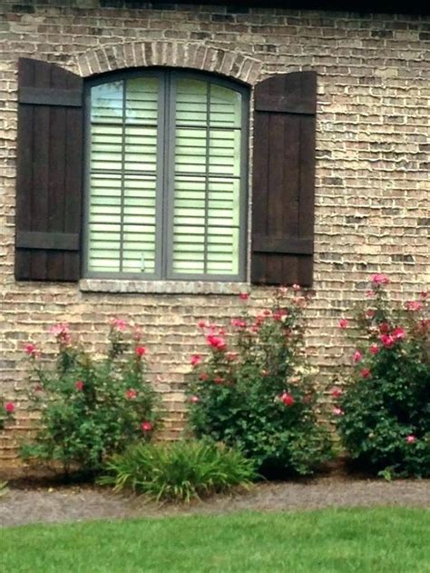 45 Stylish Exterior Paint Colors Brown Brick Ideas To Try Today in 2020 | Shutters exterior