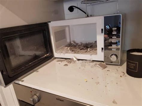 Family's $99 Aldi microwave explodes seconds after father puts his one-year-old daughter on floor