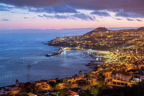 View of Funchal harbour and town at dusk, Funchal, Madeira, Portugal ...