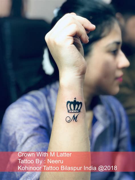 Crown with m Latter Tattoo | Wrist tattoos words, Name tattoos for girls, Tattoo lettering