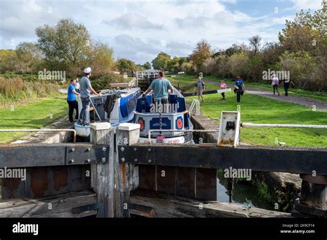 Caen Hill Locks on the Kennet and Avon Canal with lock gates and narrow ...