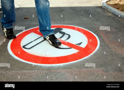 smoking ban or smoking prohibited sign with pictogram of a filter ...